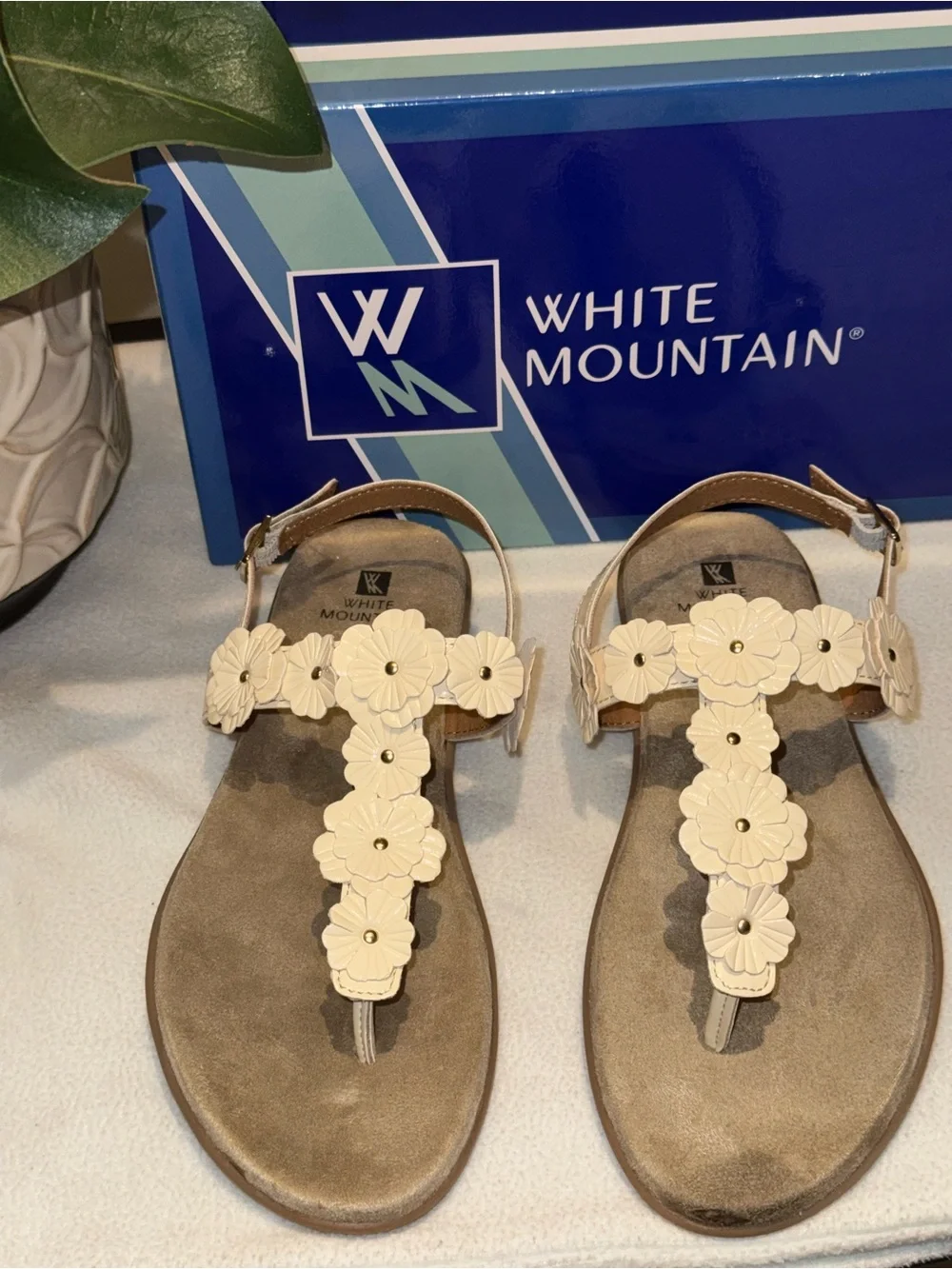 White Mountain Liftoff Flat Sandals feature delicate floral applique on T-strap